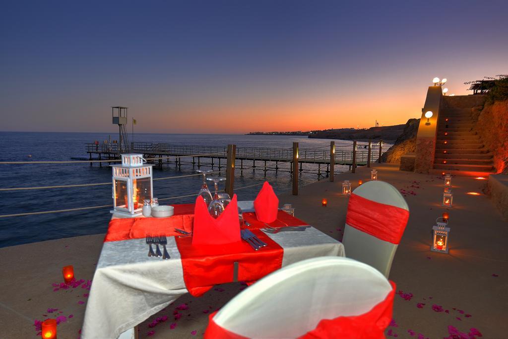 Stella Di Mare Beach Hotel & Spa Sharm el-Sheikh Exterior photo Sunset at the Fort